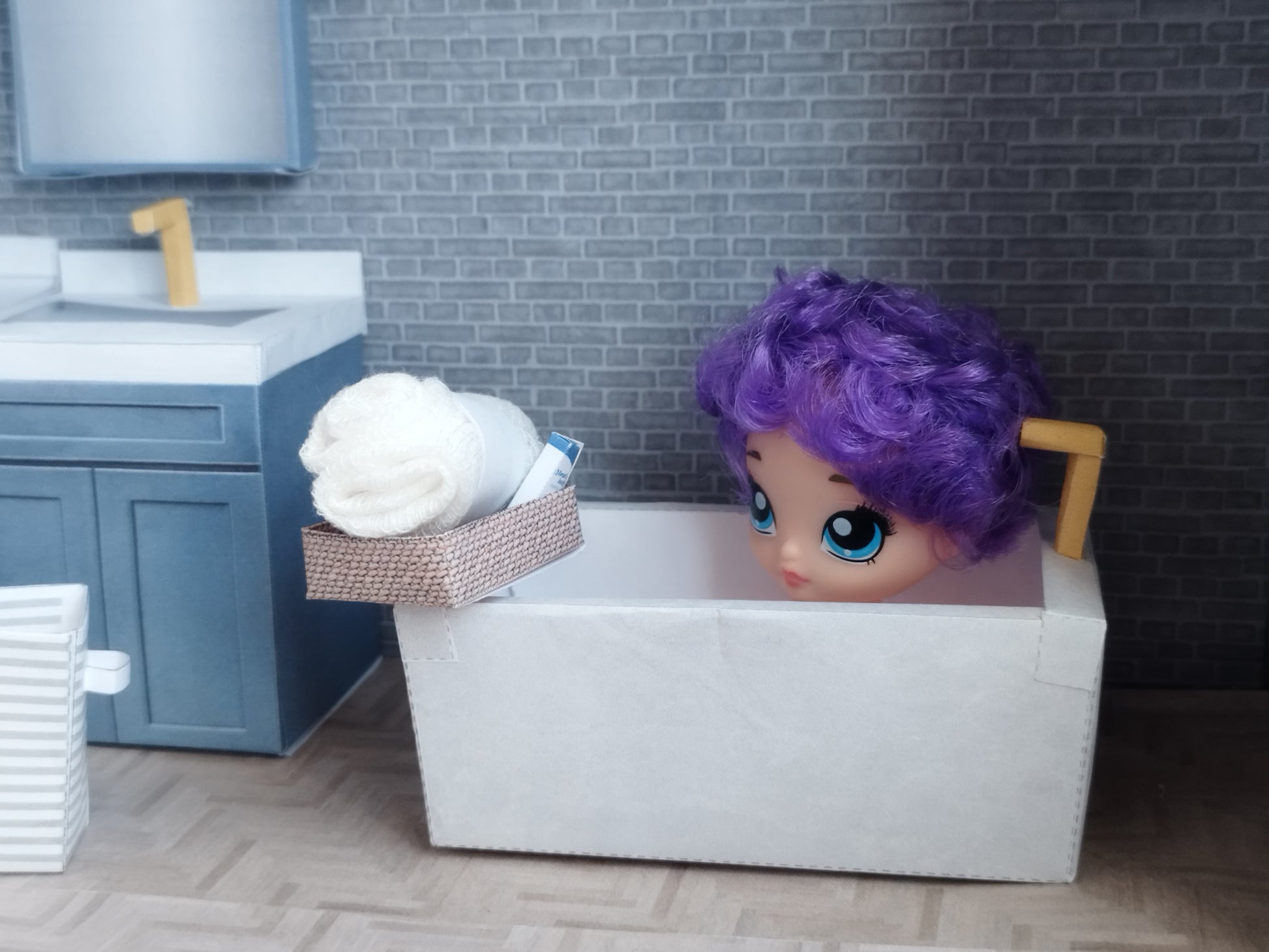 A digital printable template for a 1:12 scale dollhouse bathtub, designed for BMM shoe box bathroom scenes. The template features a detailed, elegant bathtub with clean lines, ready to be printed on regular paper, cut, and assembled for a miniature bathroom setup.