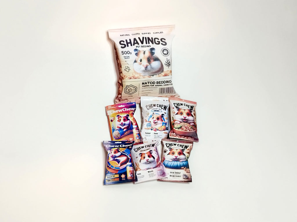 A digital preview of a printable 1:6 scale miniature template kit for dollhouse hamster pet accessories. The kit showcases 7 styles, including colorful hamster food bags, snack packets, wooden chip piles, and cozy pet bedding, arranged for a charming dollhouse pet scene.

