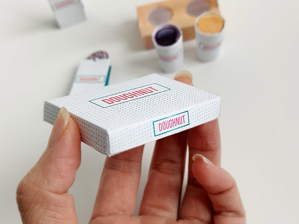 Printable dollhouse fast food set with doughnuts, coffee, and tray, DIY miniature template for dolls.