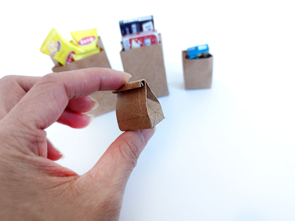 A set of 1:6 and 1:12 scale printable brown paper shopping bags in three sizes, designed for dollhouse supermarkets or dioramas, featuring craft paper or color print options for detailed, miniature shopping scenes.