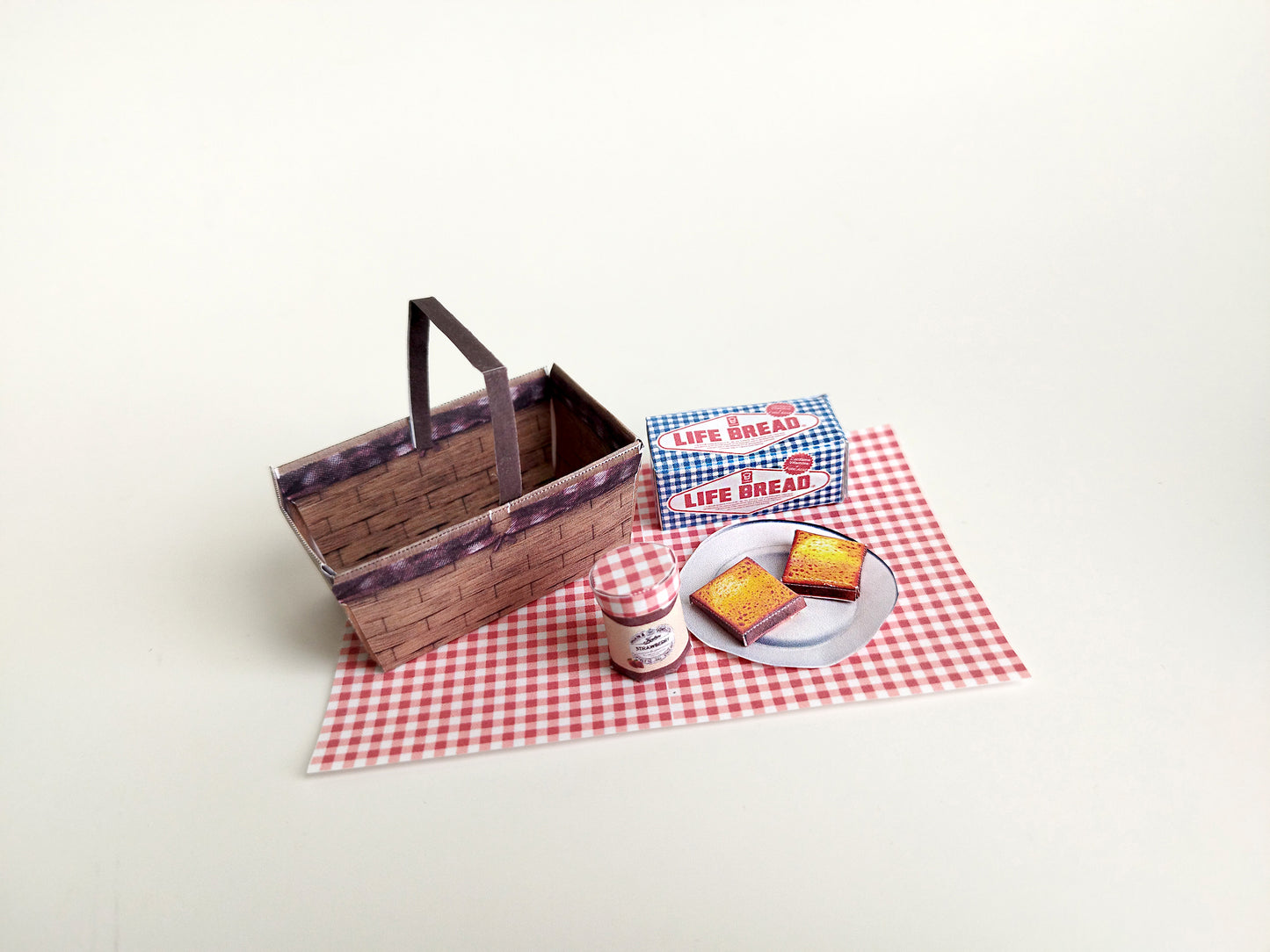 7 items Spring Picnic Outdoor basket, Mat, White bread loaf, Sided white breads, Strawberry jam and Plate, miniature project