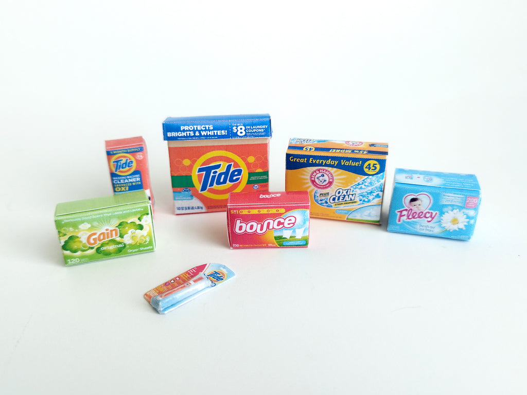 Explore 1:6 and 1:12 scale miniature laundry products for dolls and Barbie dollhouse laundry rooms. Discover 7 unique styles of detergents and accessories, perfect for creating a detailed, realistic miniature project.