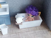 A digital printable template for a 1:12 scale dollhouse bathtub, designed for BMM shoe box bathroom scenes. The template features a detailed, elegant bathtub with clean lines, ready to be printed on regular paper, cut, and assembled for a miniature bathroom setup.