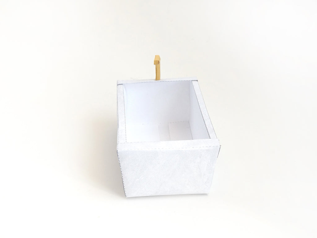 A digital printable template for a 1:12 scale dollhouse bathtub, designed for BMM shoe box bathroom scenes. The template features a detailed, elegant bathtub with clean lines, ready to be printed on regular paper, cut, and assembled for a miniature bathroom setup.
