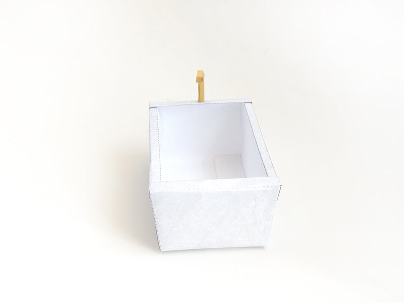 A digital printable template for a 1:12 scale dollhouse bathtub, designed for BMM shoe box bathroom scenes. The template features a detailed, elegant bathtub with clean lines, ready to be printed on regular paper, cut, and assembled for a miniature bathroom setup.
