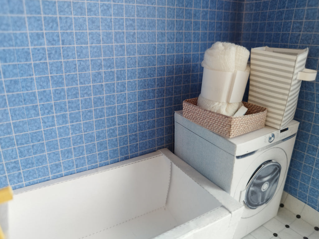 A digital printable template for a 1:12 scale dollhouse bathtub, designed for BMM shoe box bathroom scenes. The template features a detailed, elegant bathtub with clean lines, ready to be printed on regular paper, cut, and assembled for a miniature bathroom setup.