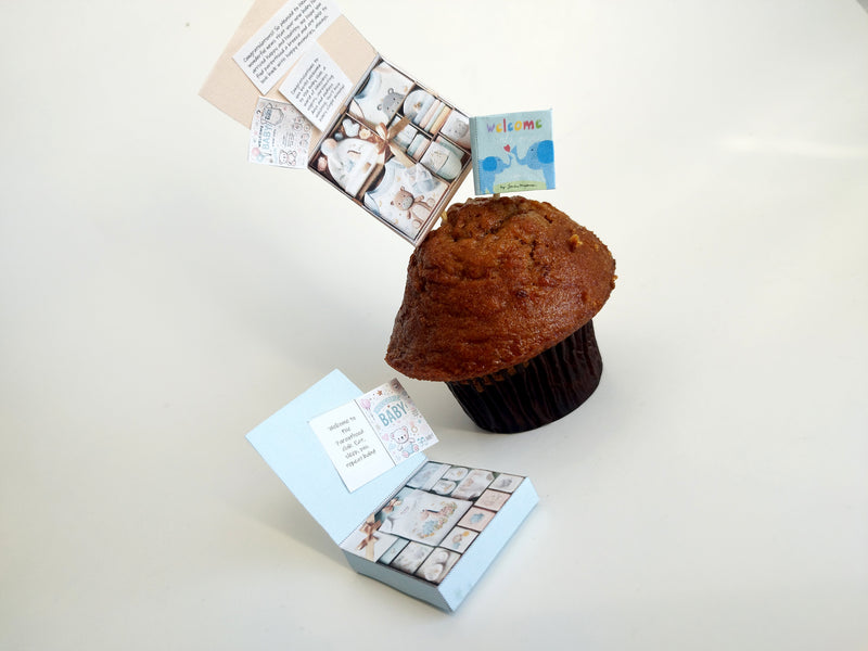 Adorn your dollhouse or baby shower cake with our adorable 1:6 Baby Clothes Set and Book!