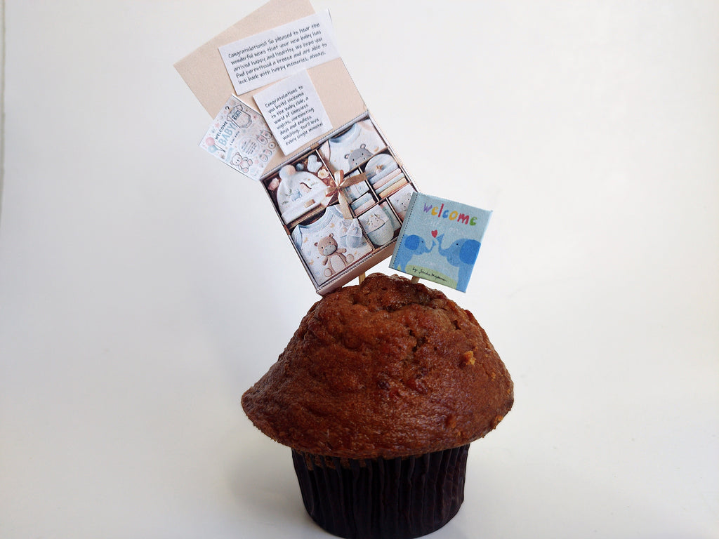 Adorn your dollhouse or baby shower cake with our adorable 1:6 Baby Clothes Set and Book!