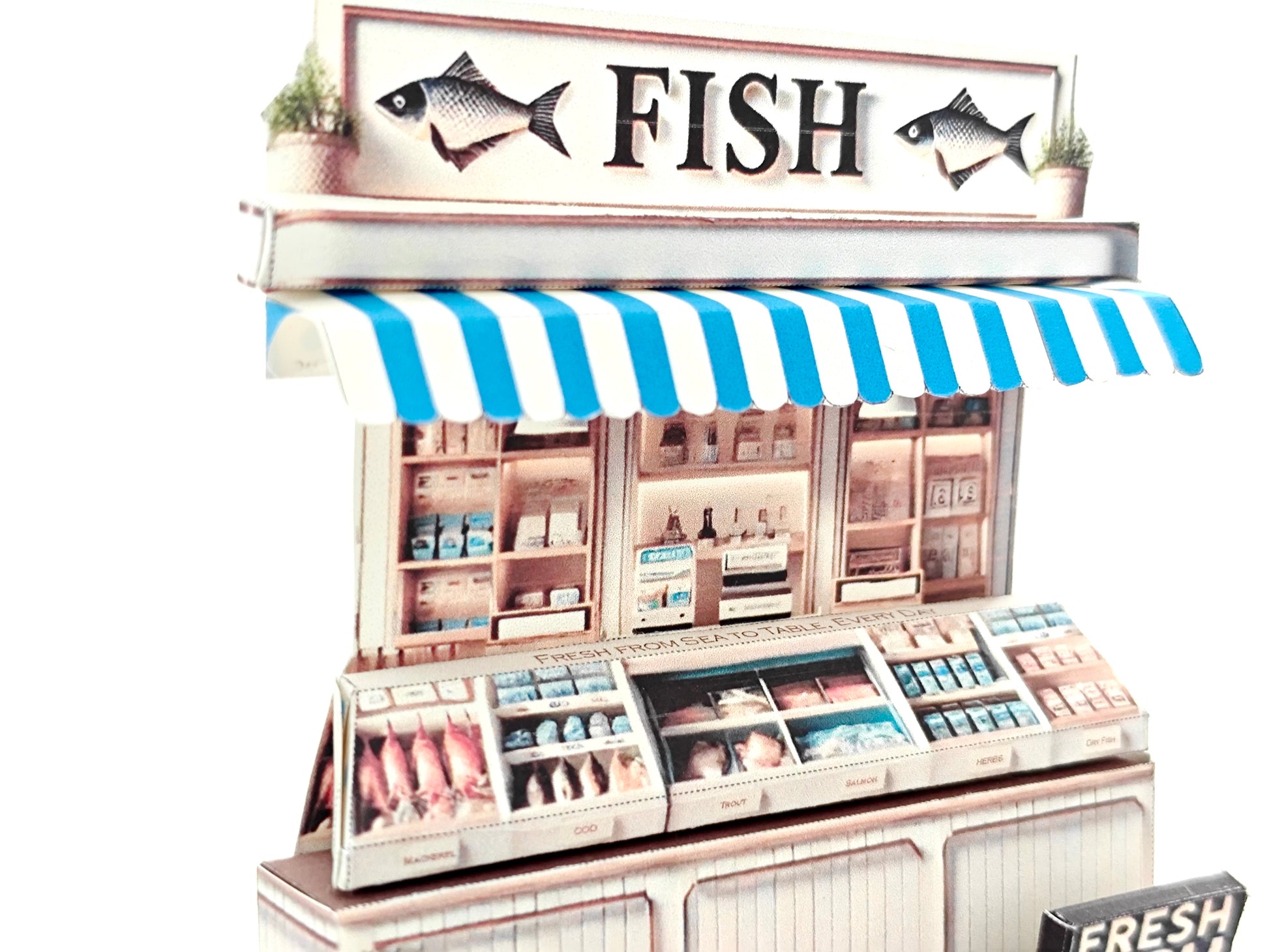 Whether as a wall decoration or a heartfelt gift, this customizable template lets you create a personalized tribute to the charm of a fish shop stand. Perfect for any occasion, this printable template brings creative 3D design to life in the form of a delightful fish shop stand miniature. Download and personalize it for those who appreciate the unique charm of a bustling fish mar