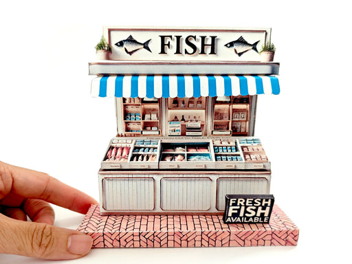 Whether as a wall decoration or a heartfelt gift, this customizable template lets you create a personalized tribute to the charm of a fish shop stand. Perfect for any occasion, this printable template brings creative 3D design to life in the form of a delightful fish shop stand miniature. Download and personalize it for those who appreciate the unique charm of a bustling fish mar