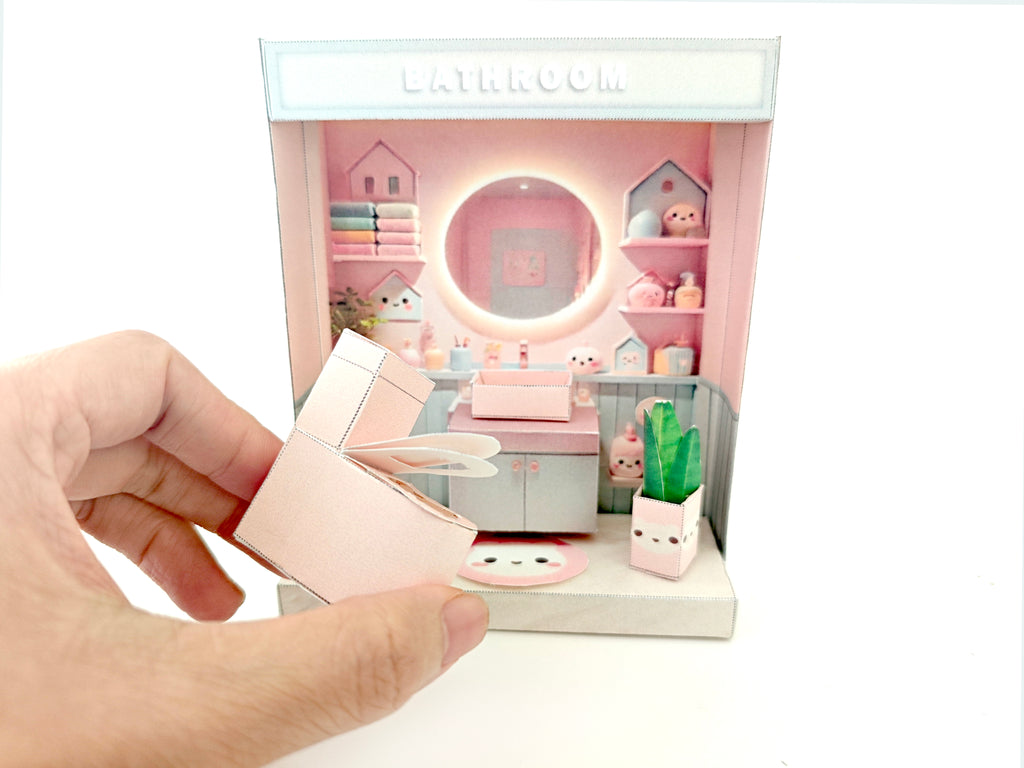 Whether as a decorative piece or a heartfelt gift, this customizable template allows you to create an adorable bathroom in miniature form. Perfect for any occasion, this DIY kit brings the charm of a cozy bathroom to life with intricate details. Download, assemble, and personalize this miniature house kit for those who appreciate the soothing and refreshing atmosphere of a well-designed bathroom.