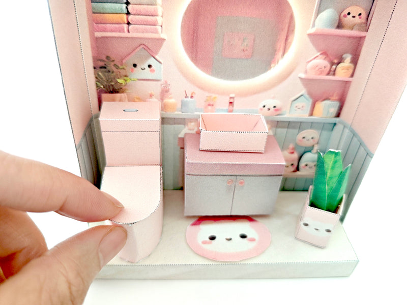 Whether as a decorative piece or a heartfelt gift, this customizable template allows you to create an adorable bathroom in miniature form. Perfect for any occasion, this DIY kit brings the charm of a cozy bathroom to life with intricate details. Download, assemble, and personalize this miniature house kit for those who appreciate the soothing and refreshing atmosphere of a well-designed bathroom.
