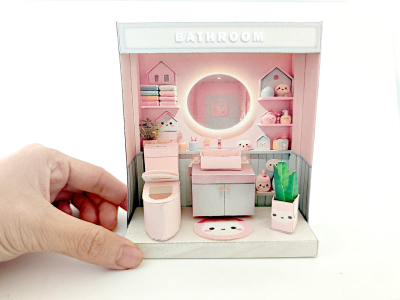 Whether as a decorative piece or a heartfelt gift, this customizable template allows you to create an adorable bathroom in miniature form. Perfect for any occasion, this DIY kit brings the charm of a cozy bathroom to life with intricate details. Download, assemble, and personalize this miniature house kit for those who appreciate the soothing and refreshing atmosphere of a well-designed bathroom.
