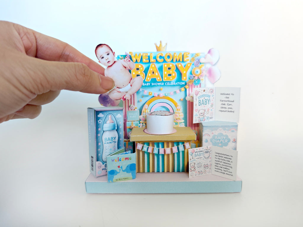  Perfect for celebrating the arrival of a little one, this printable template brings creative 3D design to life in the form of a charming baby shower-themed miniature 3D stand. 