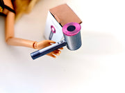 Style your dolls’ hair with this 1:6 scale Printable DIY set, featuring a hair dryer, hair straightener, and restroom essentials. This 3-item hair beauty kit doubles as a charming ornament for miniature enthusiasts.
This printable miniatures is available in a 1:6 play scale, perfect for enhancing your doll and miniature playing experience.