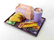 A 1:12 scale printable dollhouse fast food set featuring a taco wrap and soda, crafted as DIY templates for miniature dining scenes or yearly ornaments, ideal for detailed diorama customization.