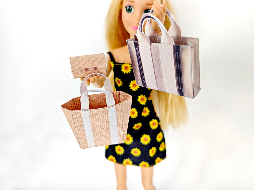 Add flair to your dollhouse or diorama with this 1:6 scale set of 3 linen tote shopping bags, including grocery bags, mini bags, and a mini wallet. Perfect for miniature department store scenes and collectors.
This printable miniatures is available in a 1:6 play scale, perfect for enhancing your doll and miniature playing experience.

