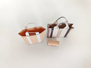 Add flair to your dollhouse or diorama with this 1:6 scale set of 3 linen tote shopping bags, including grocery bags, mini bags, and a mini wallet. Perfect for miniature department store scenes and collectors.
This printable miniatures is available in a 1:6 play scale, perfect for enhancing your doll and miniature playing experience.

