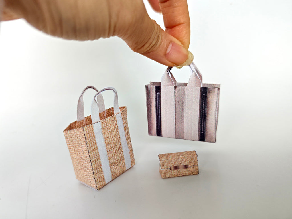 Add flair to your dollhouse or diorama with this 1:6 scale set of 3 linen tote shopping bags, including grocery bags, mini bags, and a mini wallet. Perfect for miniature department store scenes and collectors.
This printable miniatures is available in a 1:6 play scale, perfect for enhancing your doll and miniature playing experience.

