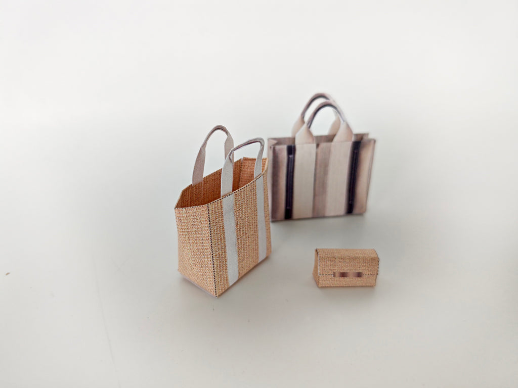 Add flair to your dollhouse or diorama with this 1:6 scale set of 3 linen tote shopping bags, including grocery bags, mini bags, and a mini wallet. Perfect for miniature department store scenes and collectors.
This printable miniatures is available in a 1:6 play scale, perfect for enhancing your doll and miniature playing experience.

