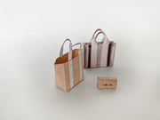 Add flair to your dollhouse or diorama with this 1:6 scale set of 3 linen tote shopping bags, including grocery bags, mini bags, and a mini wallet. Perfect for miniature department store scenes and collectors.
This printable miniatures is available in a 1:6 play scale, perfect for enhancing your doll and miniature playing experience.


