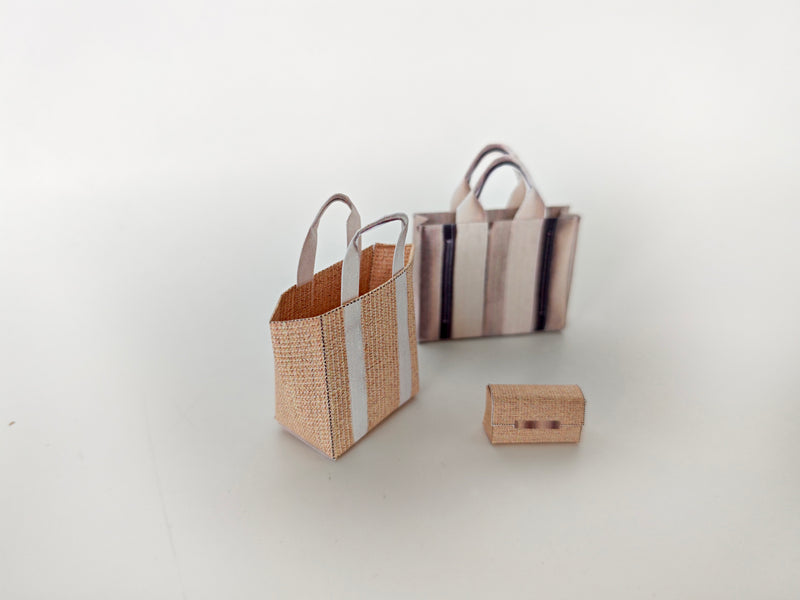 Add flair to your dollhouse or diorama with this 1:6 scale set of 3 linen tote shopping bags, including grocery bags, mini bags, and a mini wallet. Perfect for miniature department store scenes and collectors.
This printable miniatures is available in a 1:6 play scale, perfect for enhancing your doll and miniature playing experience.

