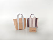 Add flair to your dollhouse or diorama with this 1:6 scale set of 3 linen tote shopping bags, including grocery bags, mini bags, and a mini wallet. Perfect for miniature department store scenes and collectors.
This printable miniatures is available in a 1:6 play scale, perfect for enhancing your doll and miniature playing experience.

