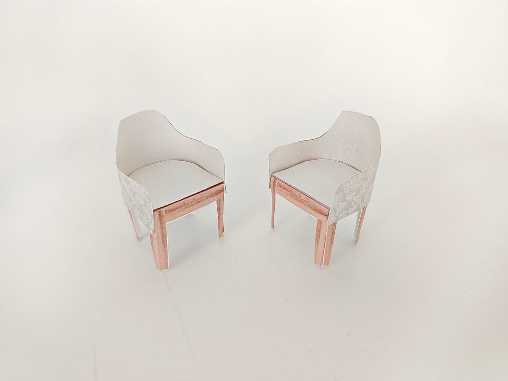 A 1:12 scale printable dollhouse furniture set from BMM Shoebox Miniature, featuring a dining table and chairs, crafted as DIY templates for a miniature living room or dining scene, ideal for diorama customization.