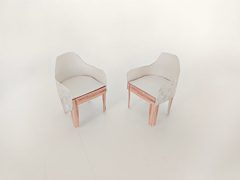 A 1:12 scale printable dollhouse furniture set from BMM Shoebox Miniature, featuring a dining table and chairs, crafted as DIY templates for a miniature living room or dining scene, ideal for diorama customization.