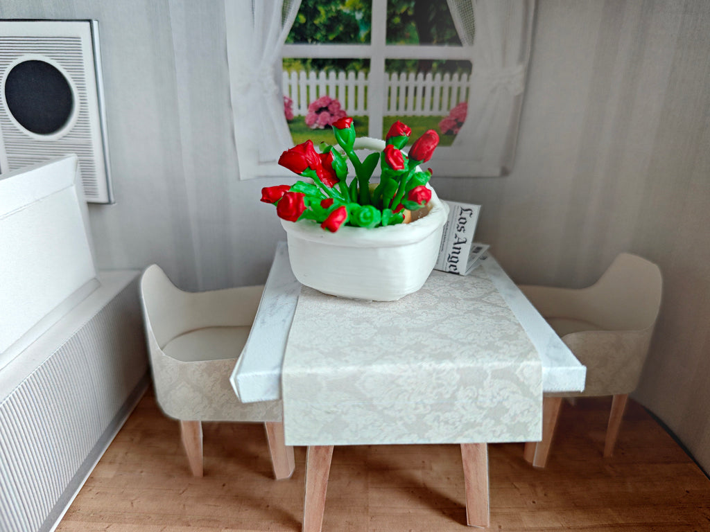 A 1:12 scale printable dollhouse furniture set from BMM Shoebox Miniature, featuring a dining table and chairs, crafted as DIY templates for a miniature living room or dining scene, ideal for diorama customization.