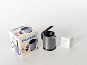 A 3D-printable STL file of a 1:12 scale miniature electric kettle with an openable lid, featuring detailed buttons and a spout for a realistic dollhouse kitchen.