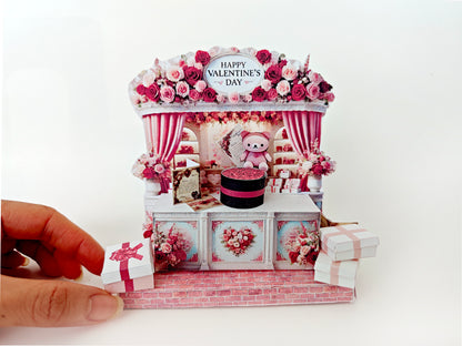 A 1:6 scale Valentine's Day gift set featuring a flower gift box, romantic cards, rose bags, and an engagement ring. Perfect for dollhouse accessories and play scale displays, this set is ideal for creating a dreamy proposal scene or adding charm to your miniature collection.

