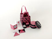 A 3D-printable STL file of a 1:6 scale Valentine’s Day gift set, featuring a flower gift box, romantic cards, rose bags, and an engagement ring, designed as charming dollhouse accessories for a miniature proposal scene or play scale display.

