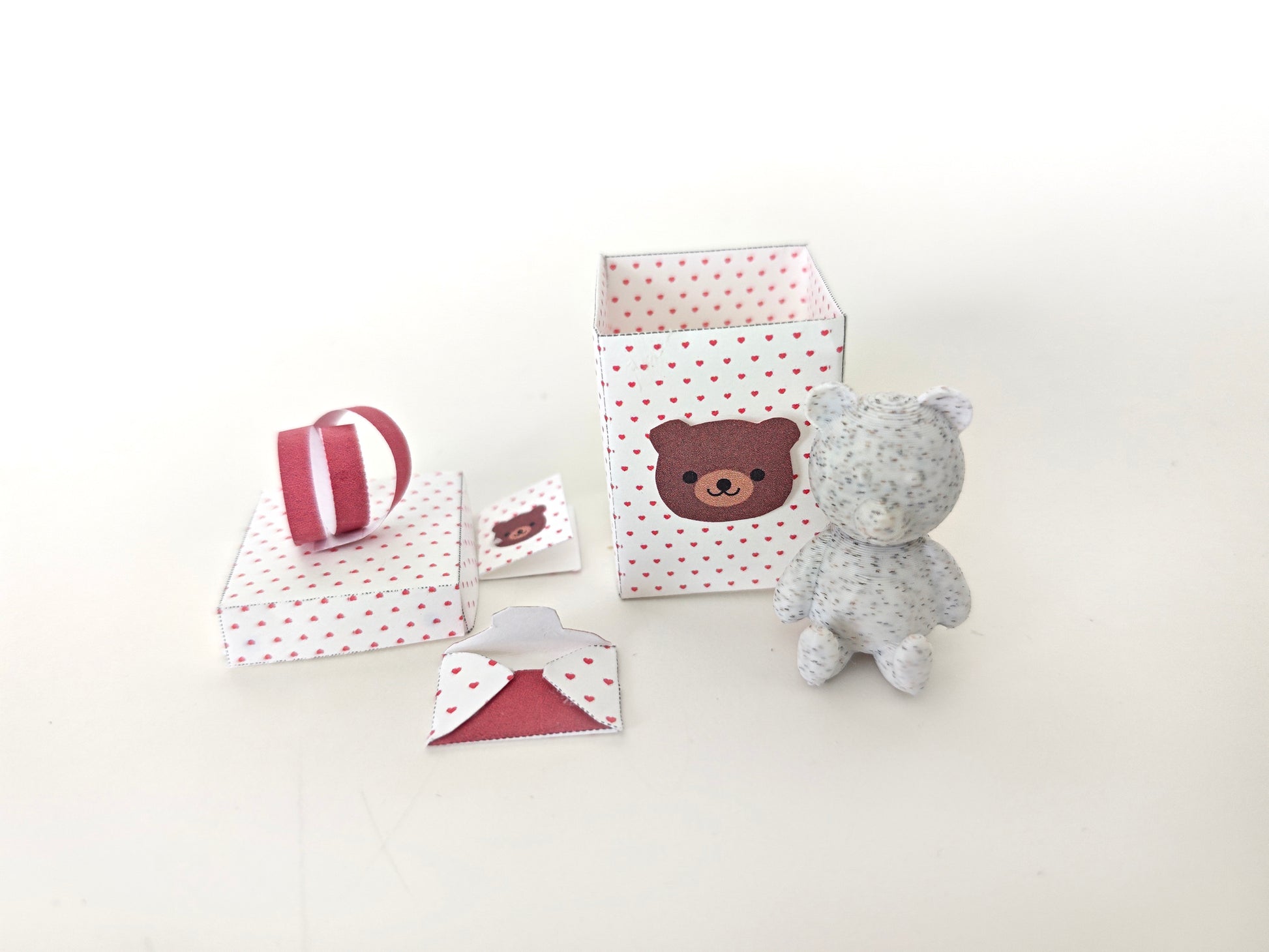 A 3D-printable STL file of a 1:12 scale little bear toy, designed with cute details for a dollhouse Valentine’s Day scene.