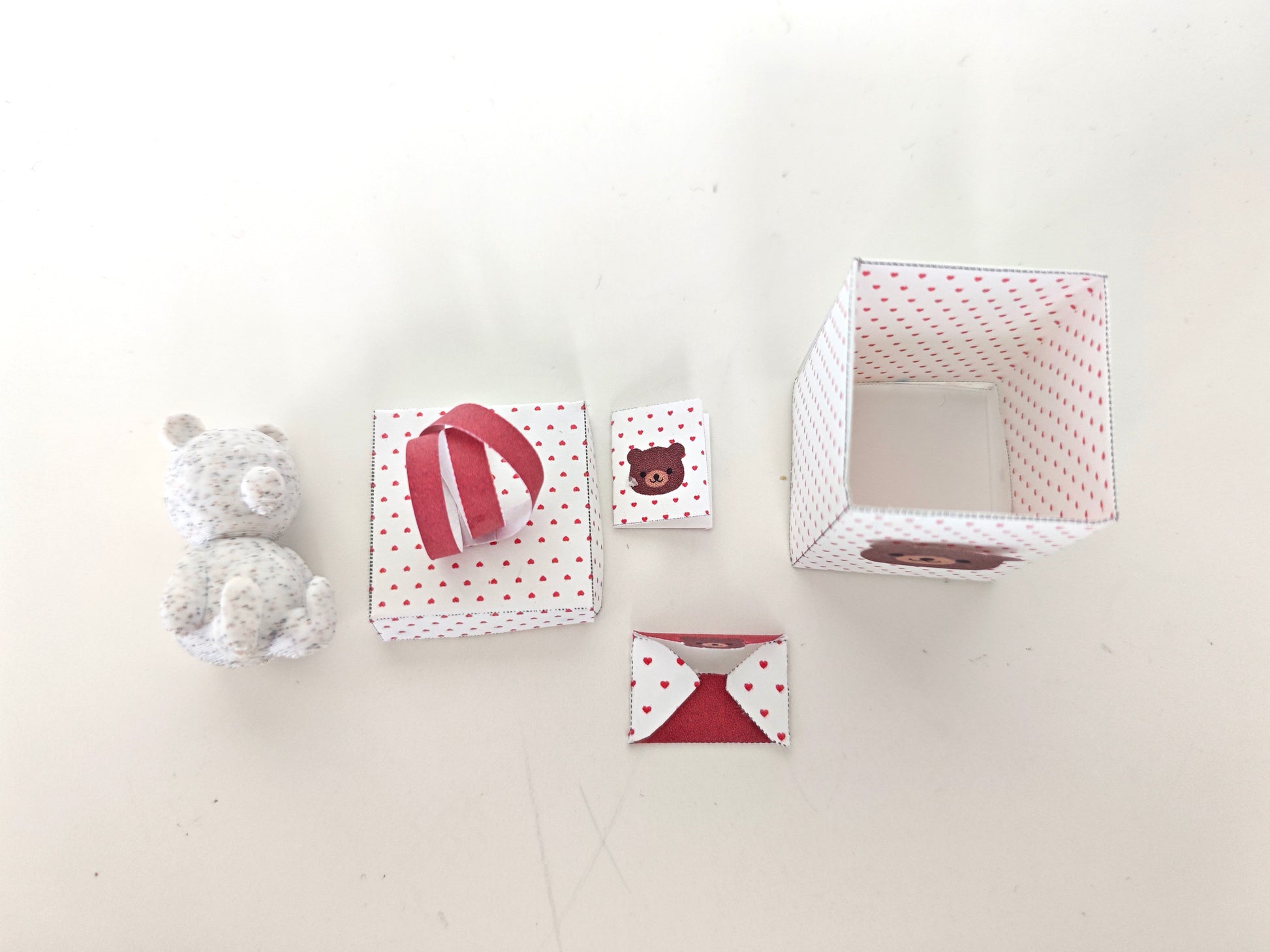 A 3D-printable STL file of a 1:12 scale little bear toy, designed with cute details for a dollhouse Valentine’s Day scene.