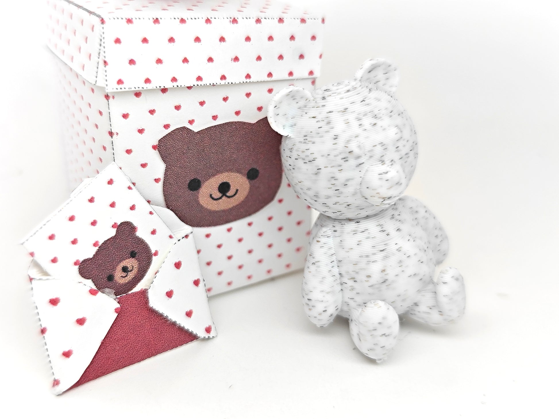 A 3D-printable STL file of a 1:12 scale little bear toy, designed with cute details for a dollhouse Valentine’s Day scene.