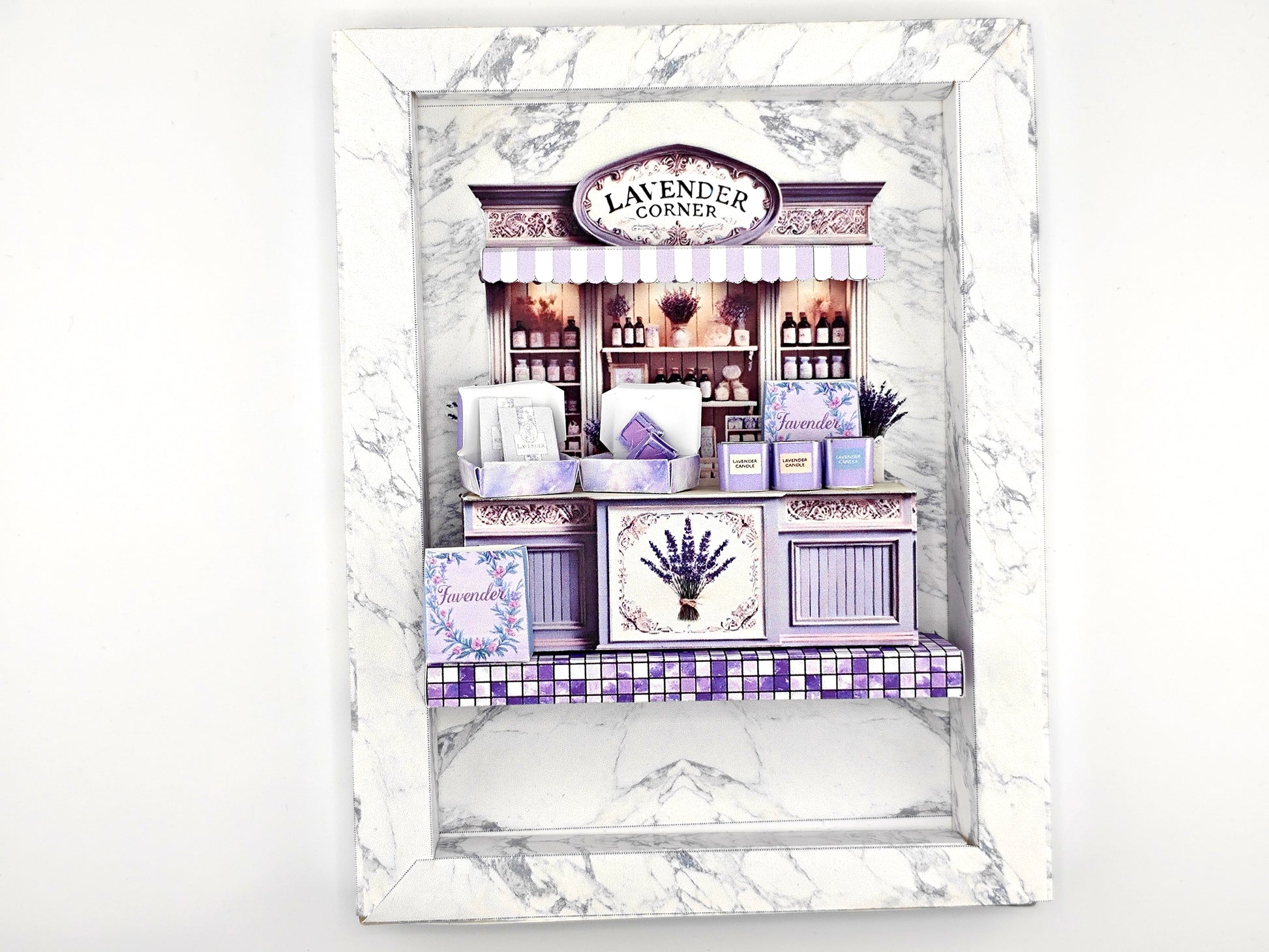 Discover the charm of Lavender Shop Miniature Stand, your one-stop shop for delightful minis and handmade treasures. Indulge in our artisan soaps, candles, and perfumes, or refresh your space with our odor removal bags. Get creative with our miniature kits and paper crafting supplies, perfect for crafting unique frame displays. Handcrafted with love, our products bring a touch of lavender magic to your home!