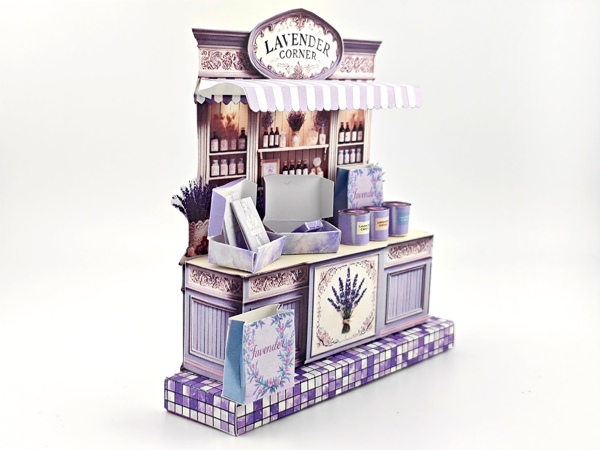 Discover the charm of Lavender Shop Miniature Stand, your one-stop shop for delightful minis and handmade treasures. Indulge in our artisan soaps, candles, and perfumes, or refresh your space with our odor removal bags. Get creative with our miniature kits and paper crafting supplies, perfect for crafting unique frame displays. Handcrafted with love, our products bring a touch of lavender magic to your home!