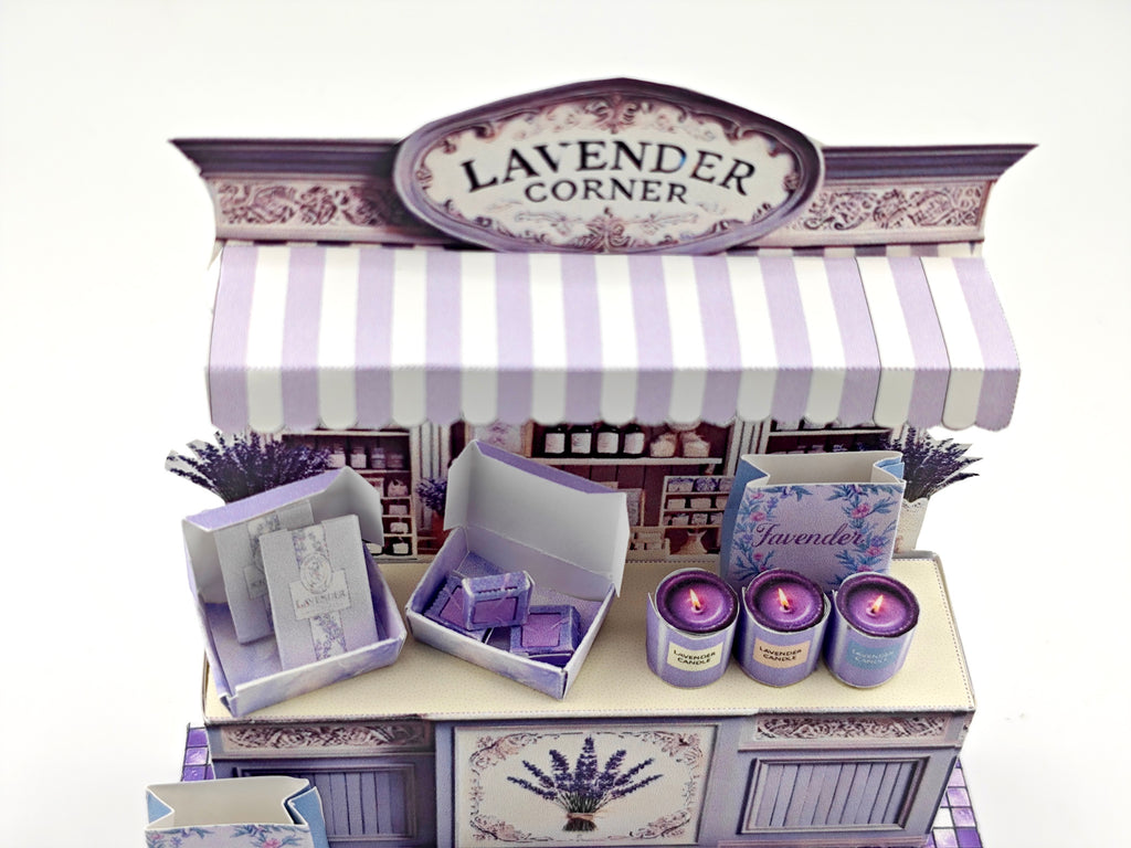 Discover the charm of Lavender Shop Miniature Stand, your one-stop shop for delightful minis and handmade treasures. Indulge in our artisan soaps, candles, and perfumes, or refresh your space with our odor removal bags. Get creative with our miniature kits and paper crafting supplies, perfect for crafting unique frame displays. Handcrafted with love, our products bring a touch of lavender magic to your home!