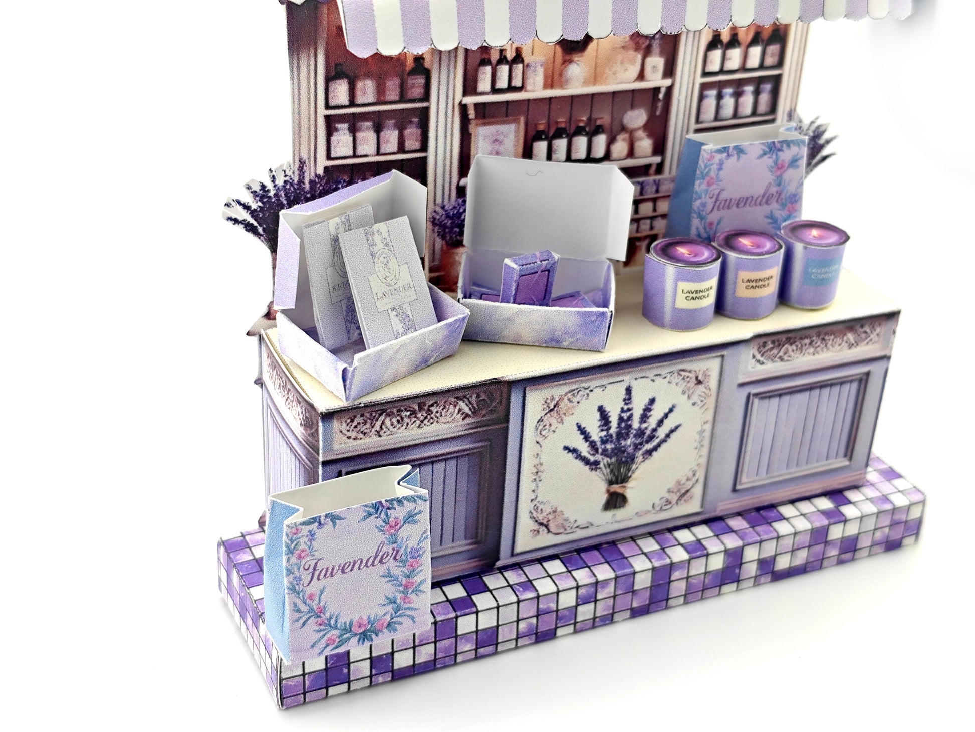 Discover the charm of Lavender Shop Miniature Stand, your one-stop shop for delightful minis and handmade treasures. Indulge in our artisan soaps, candles, and perfumes, or refresh your space with our odor removal bags. Get creative with our miniature kits and paper crafting supplies, perfect for crafting unique frame displays. Handcrafted with love, our products bring a touch of lavender magic to your home!