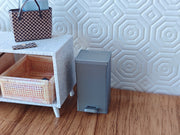 1:12 scale miniature trash can model, perfect for dollhouses, dioramas, or miniature scenes such as a kitchen or living room. The model replicates a modern, dual-compartment trash can with capacities of 30L and 15L in real-world scale (scaled down proportionally to 1:12), featuring a functional pedal mechanism for hands-free operation. 