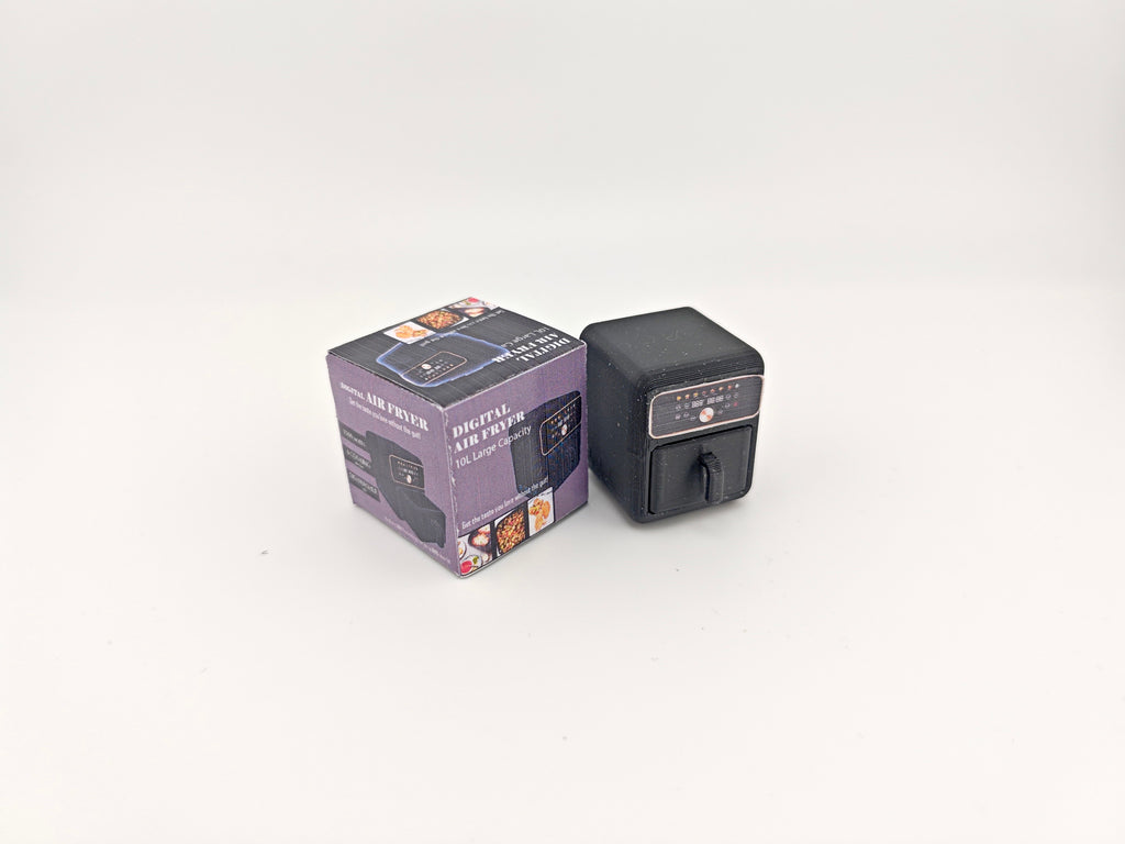 Download this 1:12 scale classic air fryer 3D printing file, perfect for mini cookware enthusiasts and collectors. Ideal for creating detailed kitchen miniatures, this STL file includes packaging and supports real-cook designs. Enhance your dollhouse or mini cooking setup with this tiny appliance today