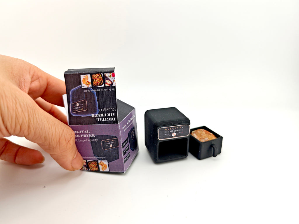 Download this 1:12 scale classic air fryer 3D printing file, perfect for mini cookware enthusiasts and collectors. Ideal for creating detailed kitchen miniatures, this STL file includes packaging and supports real-cook designs. Enhance your dollhouse or mini cooking setup with this tiny appliance today