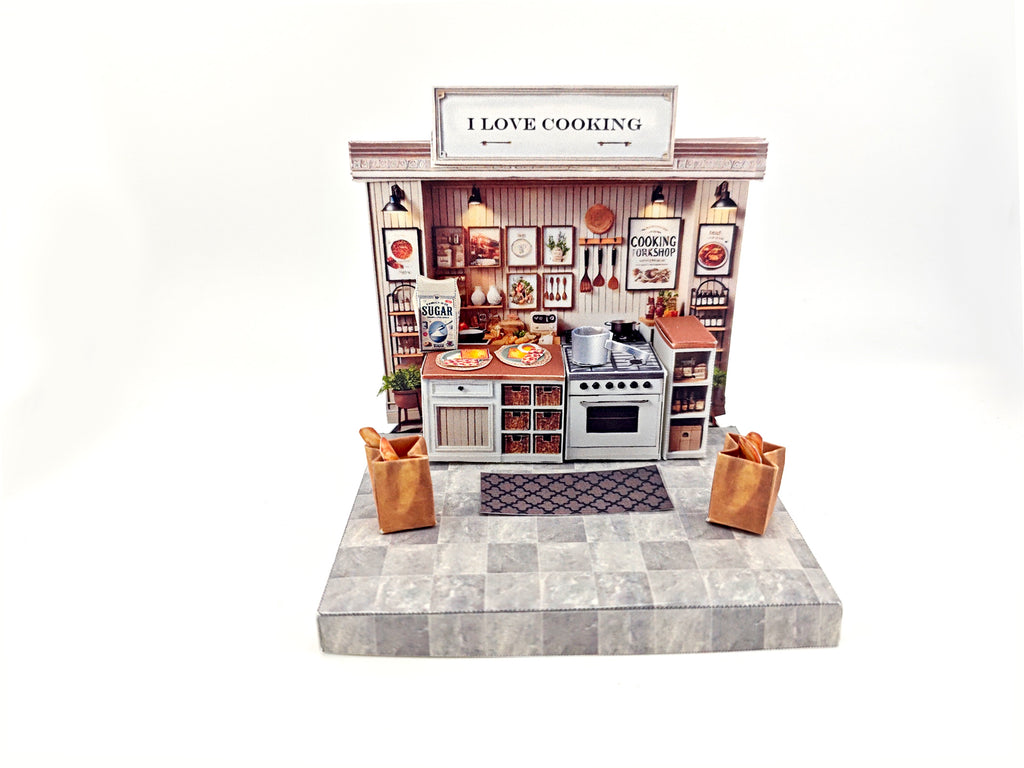 Discover the charm of a cooking kitchen miniature kit, perfect for arts and crafts enthusiasts. This detailed diorama features a mini kitchen with a stove, backdrop, and accessories, ideal for designing a tiny house or indulging in a creative hobby. Craft your own culinary masterpiece in miniature form!