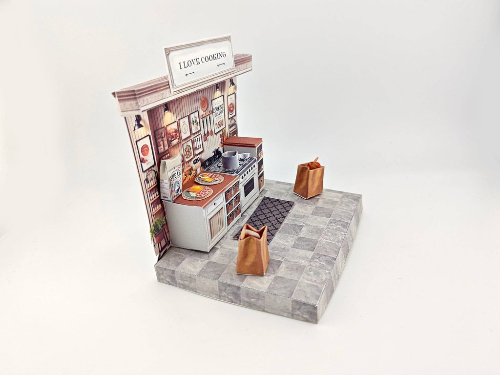 Discover the charm of a cooking kitchen miniature kit, perfect for arts and crafts enthusiasts. This detailed diorama features a mini kitchen with a stove, backdrop, and accessories, ideal for designing a tiny house or indulging in a creative hobby. Craft your own culinary masterpiece in miniature form!