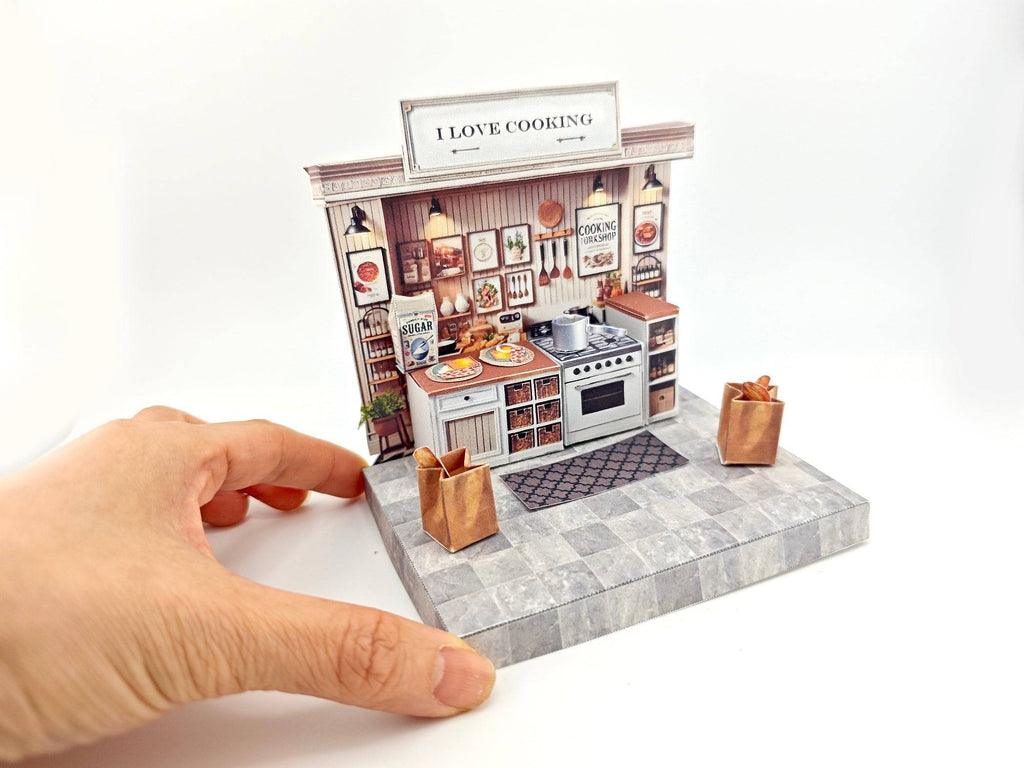 Discover the charm of a cooking kitchen miniature kit, perfect for arts and crafts enthusiasts. This detailed diorama features a mini kitchen with a stove, backdrop, and accessories, ideal for designing a tiny house or indulging in a creative hobby. Craft your own culinary masterpiece in miniature form!