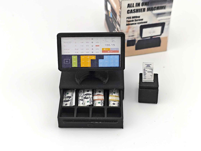 Bring your miniature shop to life with this 1:12 scale all-in-one POS cashier machine! Complete with dual screens, a cash drawer, receipt, and mini money details — perfect for mini marts, doll supermarkets, and store dioramas. A fun and detailed accessory for any dollhouse scene!