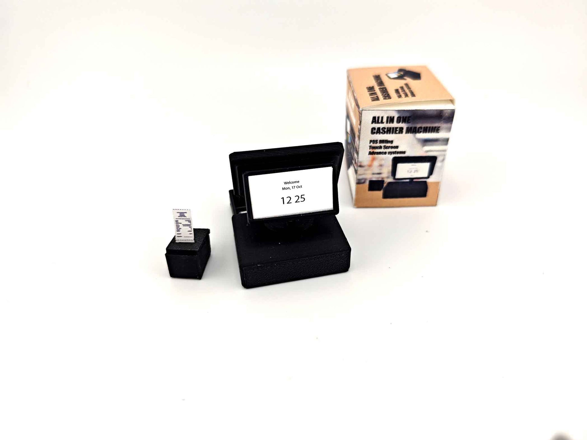 Bring your miniature shop to life with this 1:12 scale all-in-one POS cashier machine! Complete with dual screens, a cash drawer, receipt, and mini money details — perfect for mini marts, doll supermarkets, and store dioramas. A fun and detailed accessory for any dollhouse scene!
