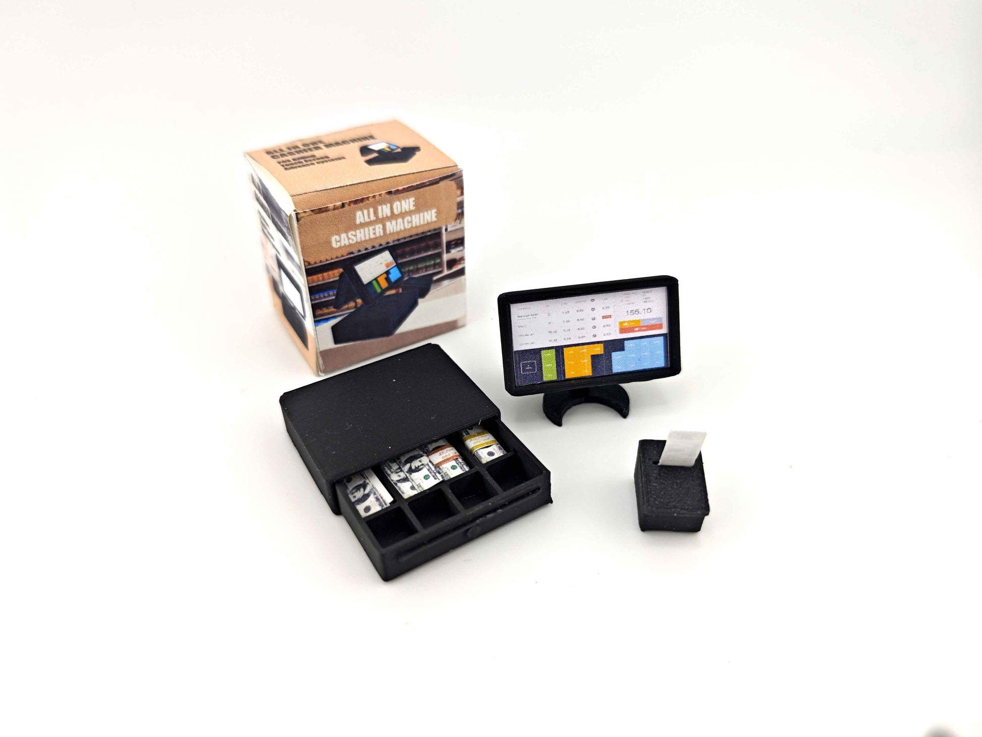 Bring your miniature shop to life with this 1:12 scale all-in-one POS cashier machine! Complete with dual screens, a cash drawer, receipt, and mini money details — perfect for mini marts, doll supermarkets, and store dioramas. A fun and detailed accessory for any dollhouse scene!