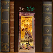 Bridal home book nook paper craft with wedding celebration scene, displayed inside a bookshelf